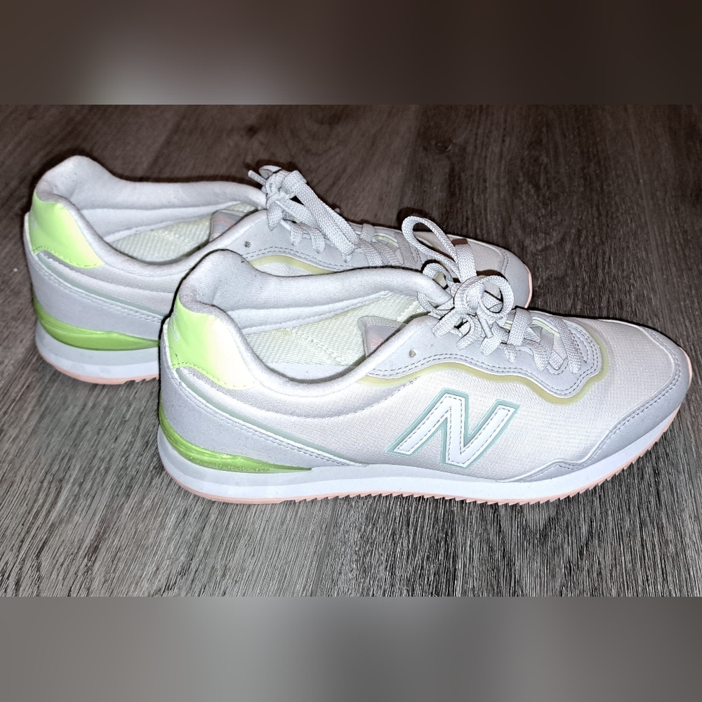 Women's New Balance Sola sleek in white, with neon yellow/ peach, Size 7.5